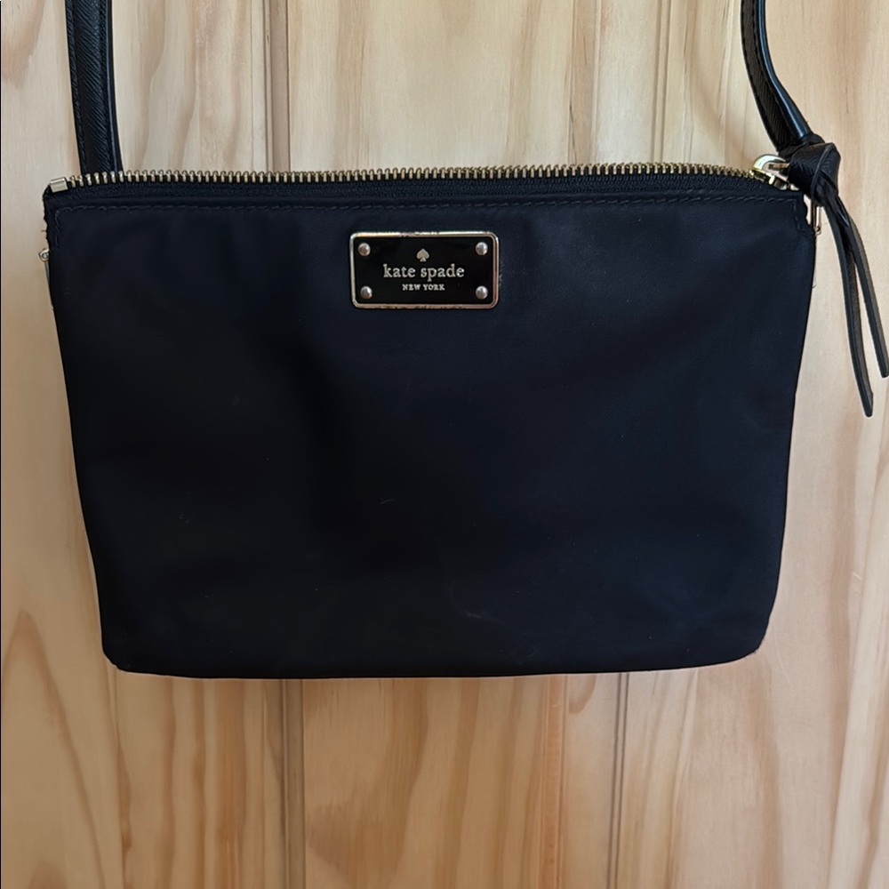 Kate Spade Black Crossbody Bag with Minimal Detailing